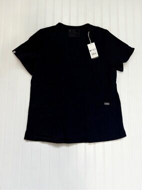 FIGS Woman’s Navy Blue Short-Sleeve Scrub Tee with two pockets